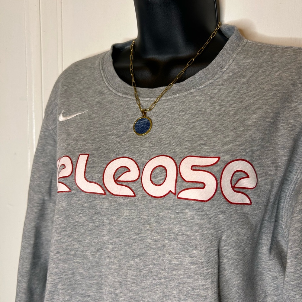 “Release” Nike Gray Sweatshirt with Red Accents